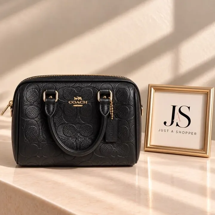 Coach Cartera Mini Rowan Crossbody (original): cartera negra de cuero con el logo de Coach